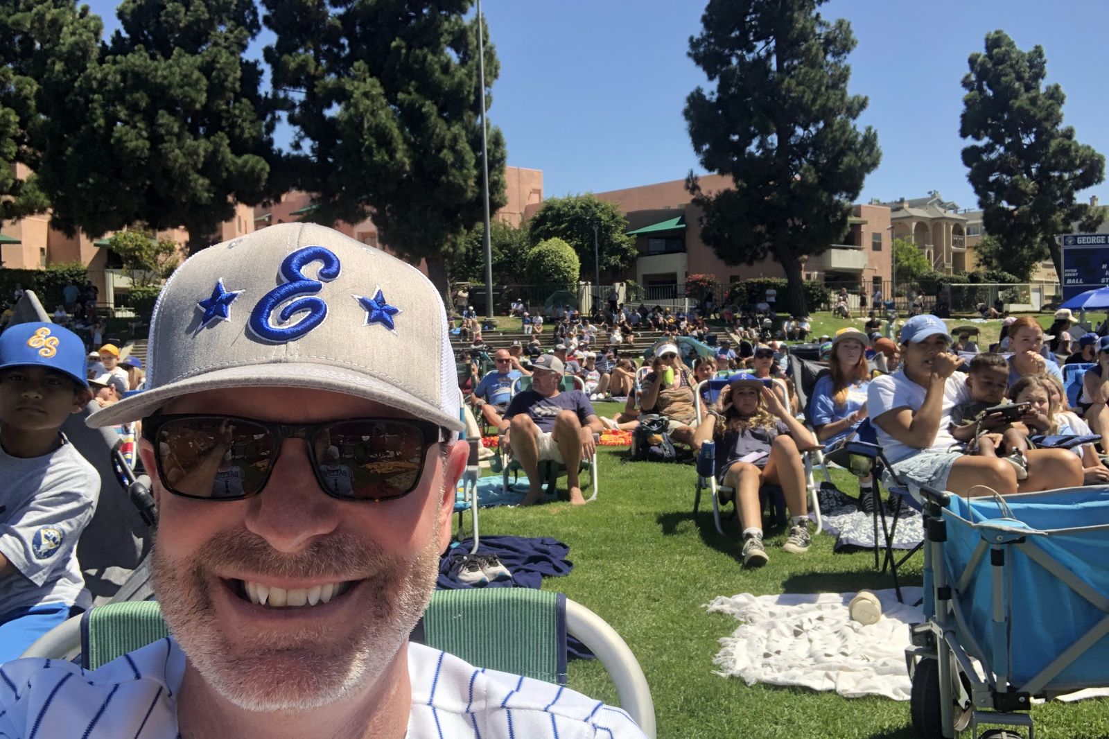 Ryan Baldino in the crowd at George Brett Field during the 2023 Little League championship run.