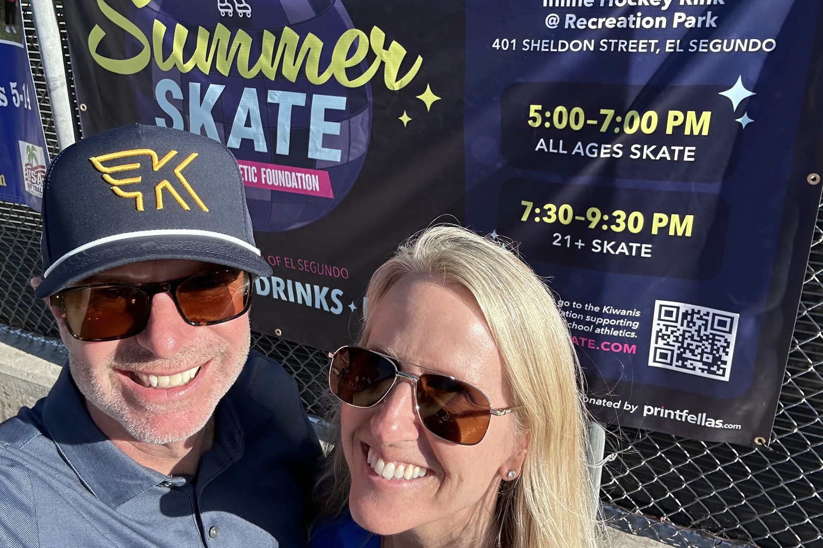 Ryan Baldino and Kara Baldino at the Summer Skate event, a banner for the Kiwanis Athletic Foundation behind them.